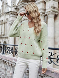 Pull motif coeurs décolleté plongeant